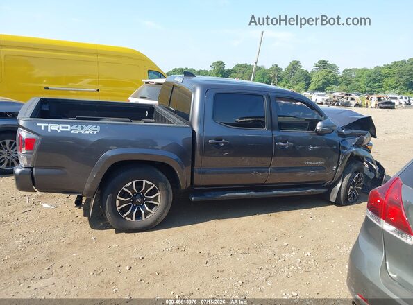 3TYCZ5AN4PT175700 2023 TOYOTA TACOMA Gray Rear interior view