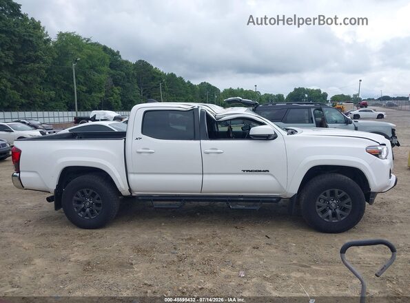 3TYCZ5AN8NT090811 2022 TOYOTA TACOMA White Rear interior view