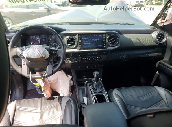 3TYCZ5AN9NT088551 2022 TOYOTA TACOMA Серый Вид панели приборов