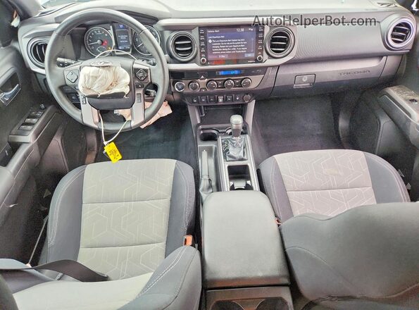 3TYCZ5AN9PT111801 2023 TOYOTA TACOMA Gray Widok deski rozdzielczej