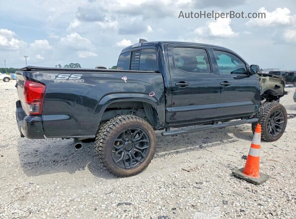 3TYCZ5AN9PT140179 2023 TOYOTA TACOMA Black Trasero derecho