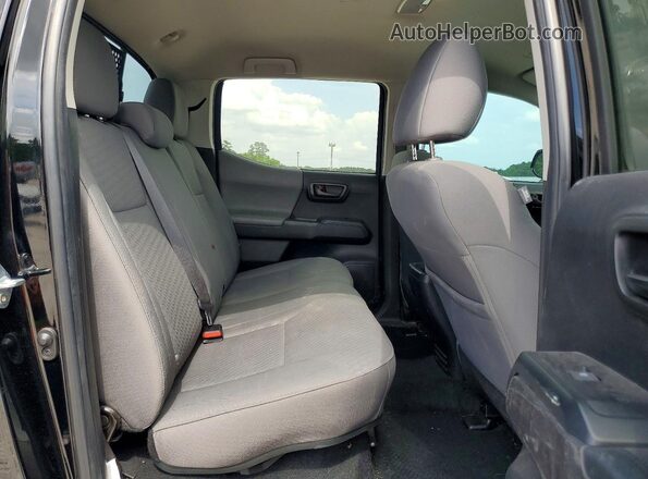 3TYCZ5AN9PT140179 2023 TOYOTA TACOMA Black Vista de los asientos traseros