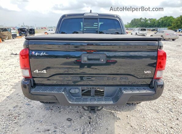 3TYCZ5AN9PT140179 2023 TOYOTA TACOMA Black Vista trasera