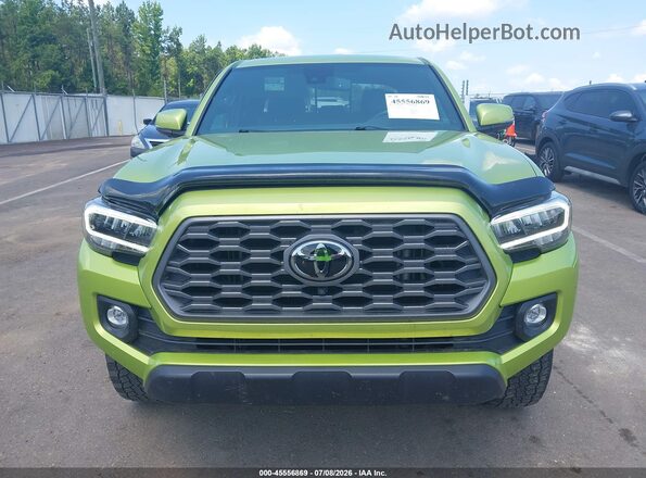 3TYCZ5ANXPT152485 2023 TOYOTA TACOMA Green Vista interior trasera