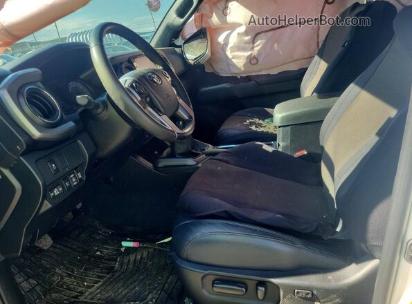 3TYCZ5ANXPT172932 2023 TOYOTA TACOMA White წინა სალონის ხედი