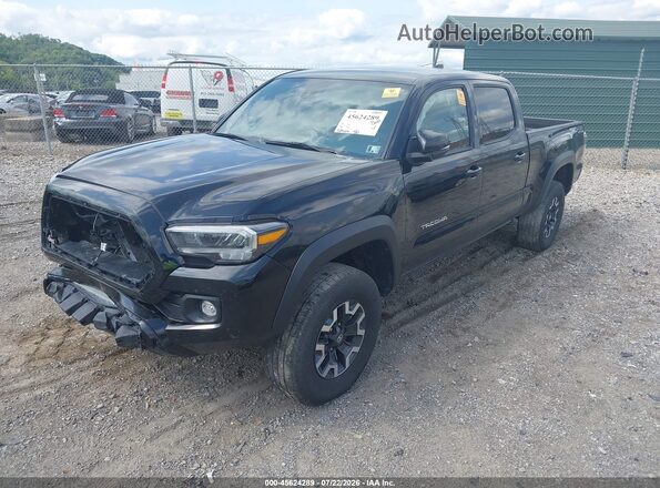 3TYDZ5BN1PT022582 2023 TOYOTA TACOMA Black Vista tres cuartos delantera izquierda