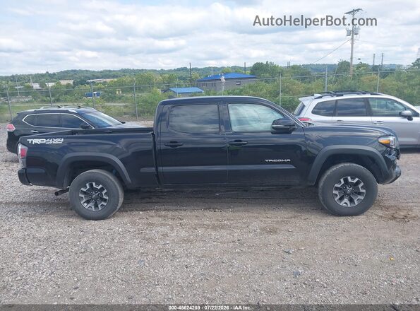 3TYDZ5BN1PT022582 2023 TOYOTA TACOMA Black Vista interior trasera