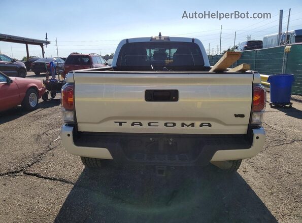 3TYDZ5BN5NT009492 2022 TOYOTA TACOMA White Вид ззаду