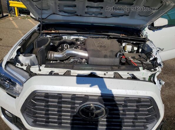 3TYDZ5BN5NT009492 2022 TOYOTA TACOMA White Вид задньої частини салону