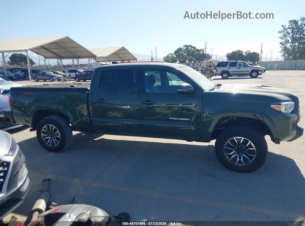 3TYDZ5BN5NT014949 2022 TOYOTA TACOMA Green Widok wnętrza z tyłu