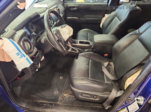 3TYDZ5BN9PT037850 2023 TOYOTA TACOMA Синий Вид салона спереди