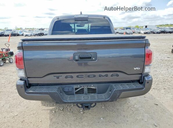 3TYEZ5CN4PT034132 2023 TOYOTA TACOMA Gray Вид ззаду