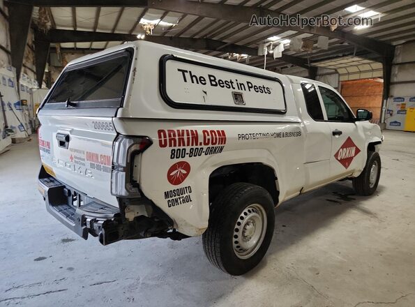3TYJDAHN0RT007690 2024 TOYOTA TACOMA White Vista de los asientos traseros