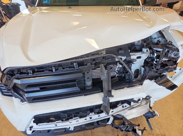 3TYJDAHN3RT008882 2024 TOYOTA TACOMA White Սալոնի հետևի տեսք