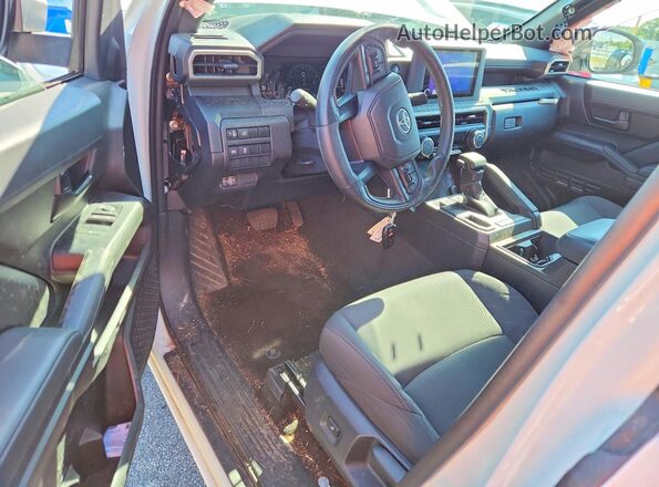 3TYJDAHN4RT008891 2024 TOYOTA TACOMA Белый Вид панели приборов