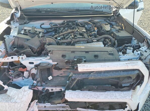 3TYJDAHNXST027435 2025 TOYOTA TACOMA Белый Вид задней части салона