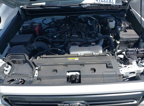 3TYKD5HN6RT002795 2024 TOYOTA TACOMA White Հետևի տեսք