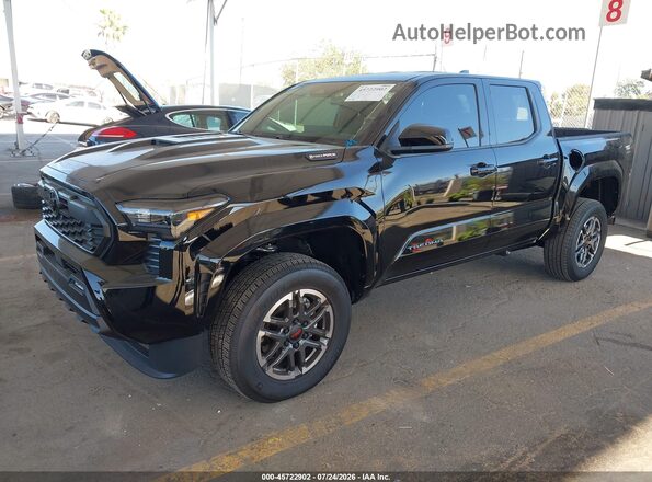 3TYLC5LN0TT068507 2026 TOYOTA TACOMA HYBRID Black Vista tres cuartos delantera izquierda
