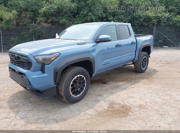 3TYLC5LN1TT055331 2026 TOYOTA TACOMA HYBRID Light Blue Առջևի ձախ երեք քառորդ տեսարան