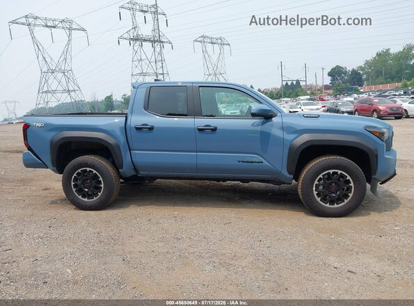 3TYLC5LN1TT055331 2026 TOYOTA TACOMA HYBRID Light Blue Սալոնի հետևի տեսք