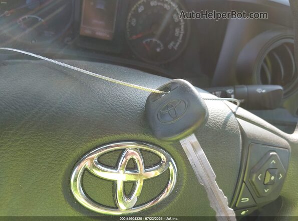 3TYRX5GN9PT077771 2023 TOYOTA TACOMA White Առջևի վահանակի տեսք