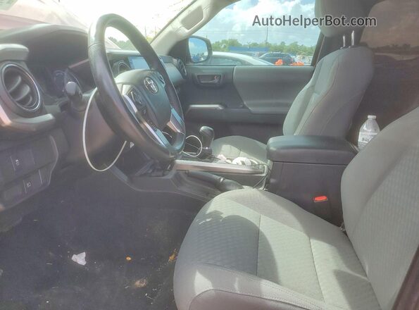 3TYRX5GNXPT072496 2023 TOYOTA TACOMA Red წინა სალონის ხედი