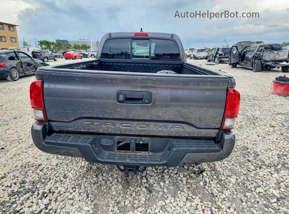 3TYRZ5CN3NT019961 2022 TOYOTA TACOMA Gray Rear view