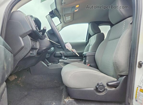 3TYSX5EN3PT017781 2023 TOYOTA TACOMA White წინა სალონის ხედი