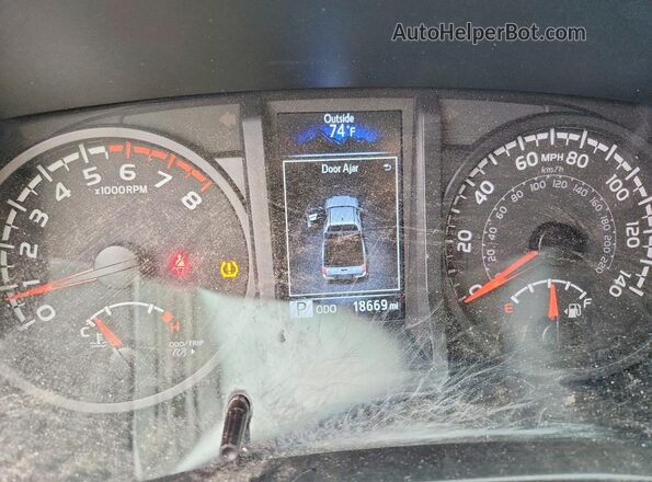 3TYSX5EN3PT017781 2023 TOYOTA TACOMA White ხელსაწყოთა პანელის ხედი