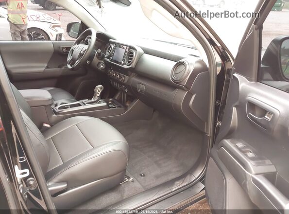 3TYSX5EN3PT021636 2023 TOYOTA TACOMA Black Вид салону спереду