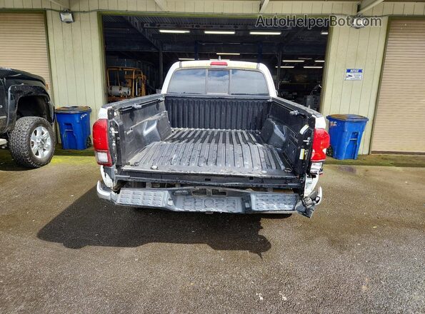 3TYSZ5AN1PT121797 2023 TOYOTA TACOMA White Rear view