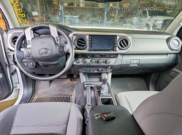 3TYSZ5AN1PT121797 2023 TOYOTA TACOMA White Dashboard view
