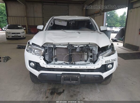 3TYSZ5ANXPT118087 2023 TOYOTA TACOMA White Սալոնի հետևի տեսք