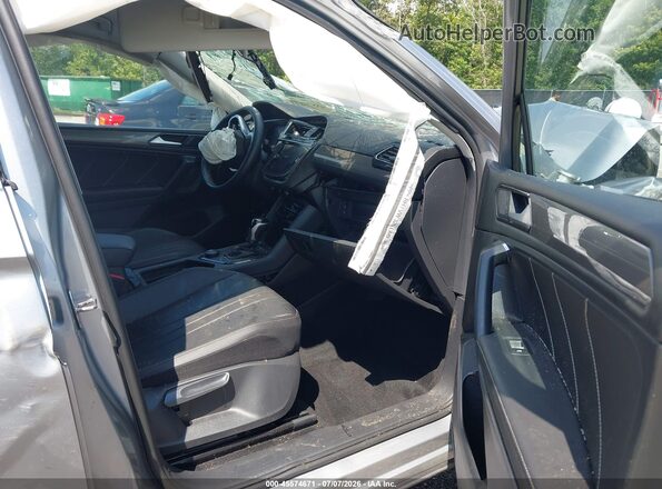 3VV2B7AX0PM061624 2023 VOLKSWAGEN TIGUAN Silver Widok wnętrza z przodu