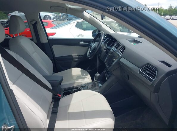 3VV2B7AX1KM185233 2019 VOLKSWAGEN TIGUAN Turquoise Front interior view