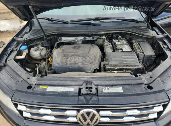 3VV2B7AX2JM001481 2018 VOLKSWAGEN TIGUAN Black Widok wnętrza z tyłu
