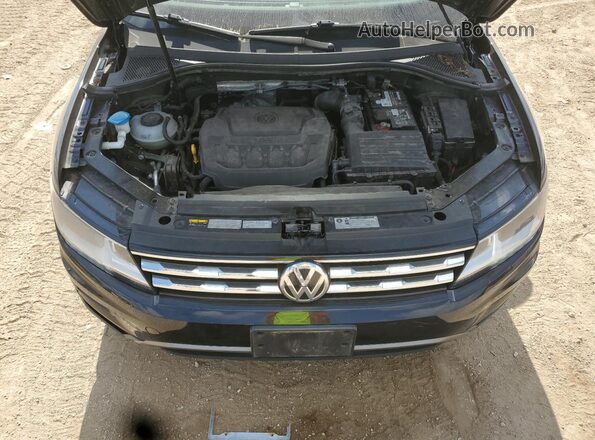 3VV2B7AX2JM075824 2018 VOLKSWAGEN TIGUAN Black Widok wnętrza z tyłu