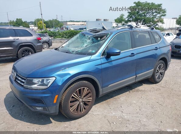 3VV2B7AX3JM059972 2018 VOLKSWAGEN TIGUAN Blue Առջևի ձախ երեք քառորդ տեսարան