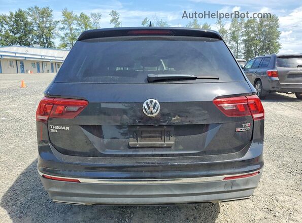 3VV2B7AX3JM219896 2018 VOLKSWAGEN TIGUAN Black Widok z tyłu