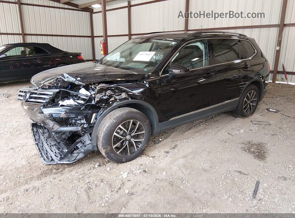 3VV2B7AX3MM061953 2021 VOLKSWAGEN TIGUAN Black Vista tres cuartos delantera izquierda