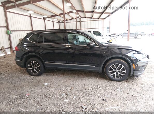 3VV2B7AX3MM061953 2021 VOLKSWAGEN TIGUAN Black Vista interior trasera