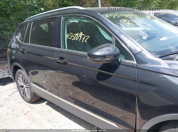 3VV2B7AX4JM110640 2018 VOLKSWAGEN TIGUAN Black Widok wnętrza z tyłu