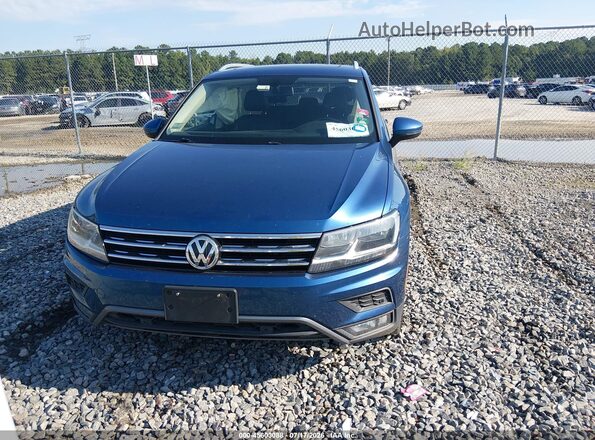 3VV2B7AX4KM092917 2019 VOLKSWAGEN TIGUAN Blue Vista interior trasera