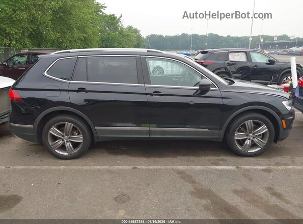 3VV2B7AX4MM057460 2021 VOLKSWAGEN TIGUAN Black Սալոնի հետևի տեսք