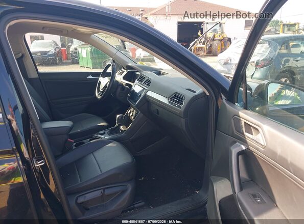 3VV2B7AX6KM071891 2019 VOLKSWAGEN TIGUAN Black Front interior view