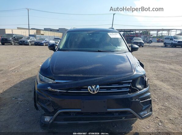 3VV2B7AX6KM071891 2019 VOLKSWAGEN TIGUAN Black Rear interior view