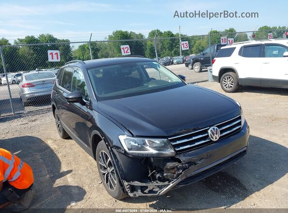 3VV2B7AX6MM043267 2021 VOLKSWAGEN TIGUAN Black Front view