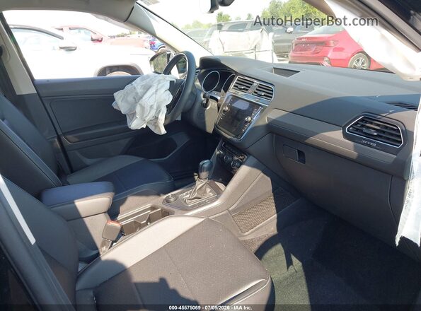3VV2B7AX6MM043267 2021 VOLKSWAGEN TIGUAN Black Front interior view