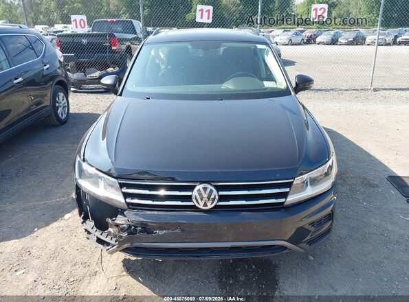 3VV2B7AX6MM043267 2021 VOLKSWAGEN TIGUAN Black Rear interior view
