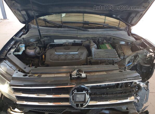 3VV2B7AX7JM172405 2018 VOLKSWAGEN TIGUAN Black Widok wnętrza z tyłu